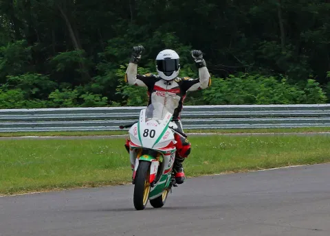 Rajiv Sethu celebrates winning the Pro-Stock 301-400cc race