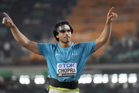 Neeraj Chopra reacts after winning the gold medal
