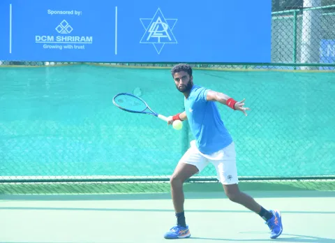 Manish Sureshkumar in action against Nitin Sinha