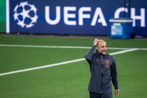 Pep Guardiola gestures  at his players during a training session ahead of Sunday’s derby match