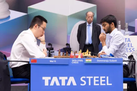 Wei Yi and Gukesh D during the tie-break round