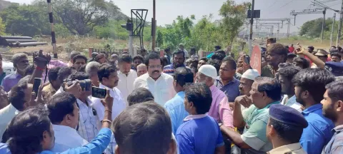 Residents stop work on railway foot-over bridge at Vasanthapuram