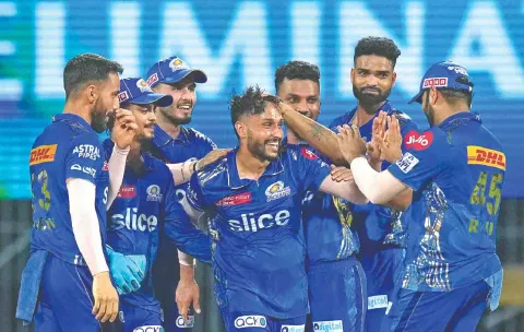 Akash Madhwal (centre) rose to the occasion on Wednesday taking five wickets against LSG.