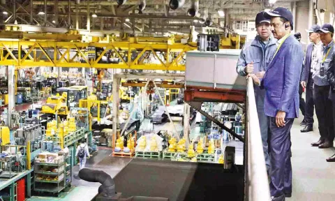 Chief Minister Stalin at the Komatsu manufacturing facility in Osaka, Japan