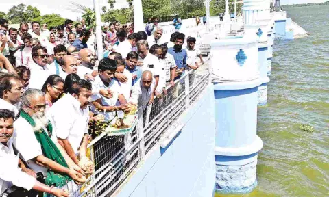 KN Nehru, district collectors, elected members and farmers release water from Grand Anicut on Friday
