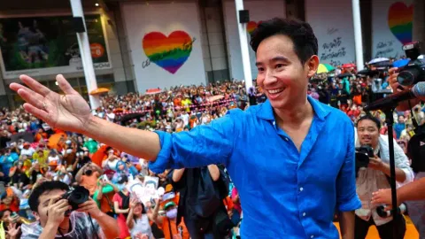 Move Forward Party leader Pita Limjaroenrat greets supporters during a rally to thank voters ahead of the vote for a new prime minister on July 13