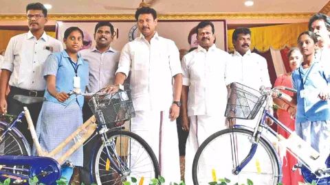 Minister Anbil Mahesh Poyyamozhi distributing free bicycles to students in Tiruchy on Friday