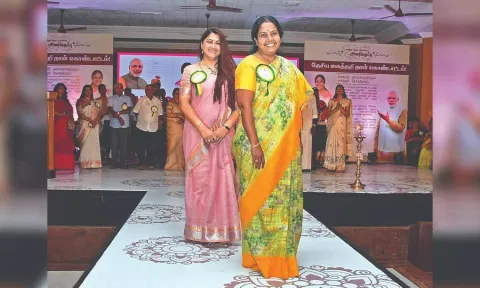 Khushbu Sundar and Vanathi Srinivasan perform a ramp walk in Coimbatore.