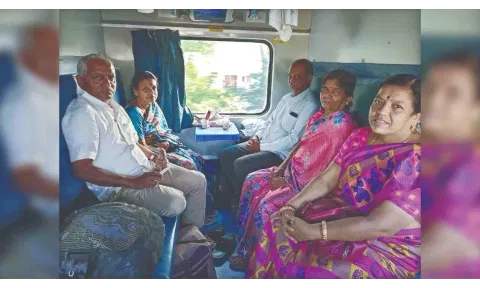 Eswaran and his family members on train to Bodi