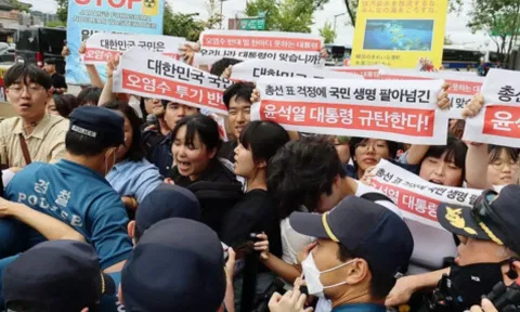 Protests outside embassy. IANS