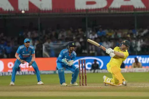 Australia's David Warner plays a shot during the second ODI cricket match between India and Australia, in Indore (PTI)