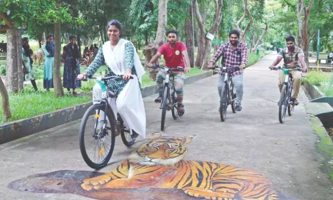 Visitors pedal around in Kurumbapatti Zoo in Salem