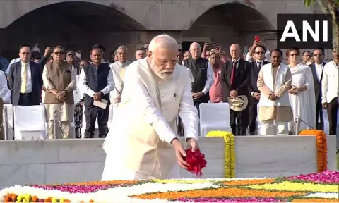 PM Modi pays his tributes to Mahatma Gandhi at Rajghat. (ANI)
