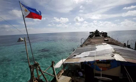 &nbsp;A Philippine flag flutters from BRP Sierra Madre, a dilapidated Philippine Navy ship (Image: REUTERS)