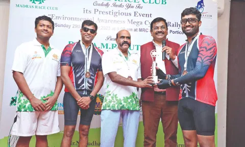 Sub Inspector Saravanan (second from left)