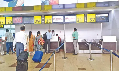 Passengers at Terminal 4 on Wednesday
