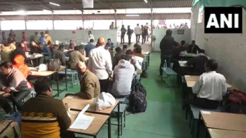 Polling materials being distributed to election officials (Photo/ANI)