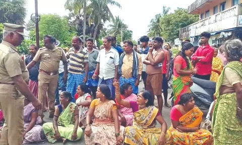 Police officials trying to pacify the protesting women