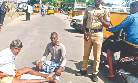 The injured sculptor staging a road roko in protest