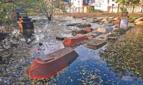 Stagnated water in the Corporation burial ground in Otteri on Sunday