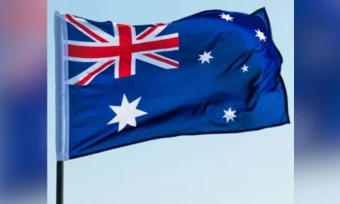 Higher tax earnings slash Australian budget deficit