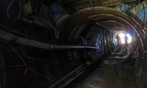 Israeli soldiers operate near the opening to what Israel's military says is an iron-girded tunnel designed by Hamas