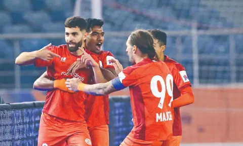 Punjab FC players celebrate their goal against CFC.