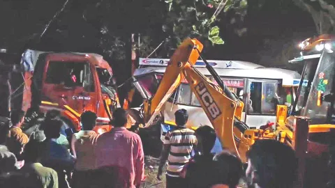 The truck being lifted with the help of a crane