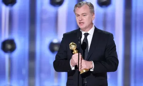 Christopher Nolan with his award at the Golden Globes 2024. (CBS)&nbsp;