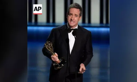 Matthew Macfadyen receives the award at the 75th Emmy Awards. (AP)