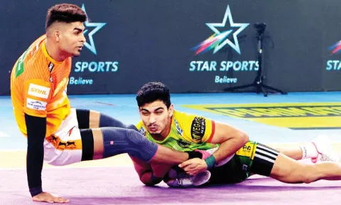 Puneri Paltan's Aslam Inamdar goes for a raid against Patna Pirates