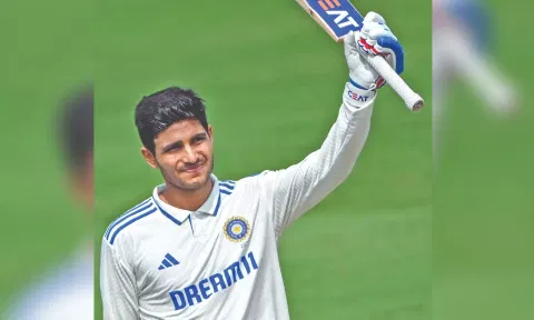 Shubman Gill celebrates after scoring his century