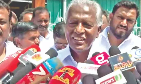 KP Munusamy talking to reporters in Salem