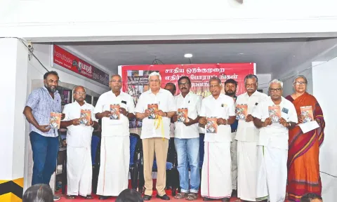 Prakash Karat and other leaders at the book release.