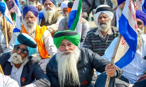 Farmers burn effigies during the 'Black Day' protest at the Punjab-Haryana Shambhu border, in Patiala district on Friday. (PTI)