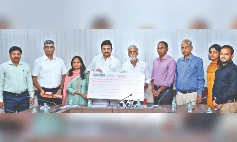CMDA handed over a cheque of Rs 5 crore to Forest Department Minister M Mathiventhan to create an urban forest in Siruseri, on Friday.