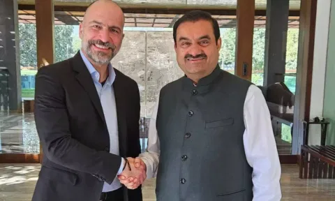 Uber CEO Dara Khosrowshahi with Gautam Adani&nbsp;