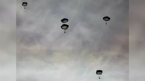 Aid is air-dropped over Gaza, amid the ongoing the conflict between Israel and Hamas, in Gaza City (Photo credits: Reuters)
