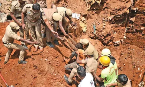 Fire and Rescue Services personnel rescuing trapped workers in The Nilgiris on Wednesday&nbsp;