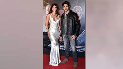 Bollywood actors Sidharth Malhotra and Disha Patani pose for a photo during the screening of the movie 'Yodha', at Jio World Drive in Mumbai. (Photo/ANI)