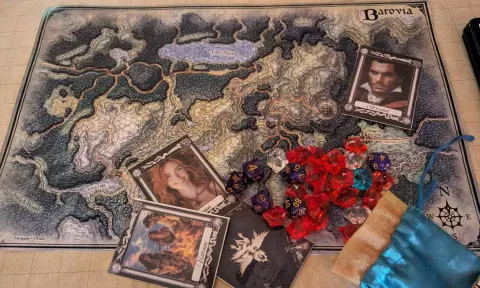 World map, the playing map, the characters, the dice, cards and the coins used for D&amp;D