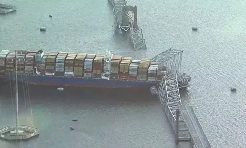 Collapsed Cargo Ship (PTI)

https://www.dtnext.in/news/world/baltimore-bridge-collapses-after-powerless-cargo-ship-rams-into-support-column-6-people-are-missing-776459