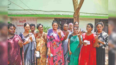 Group of transpersons pose after voting in Choolaimedu