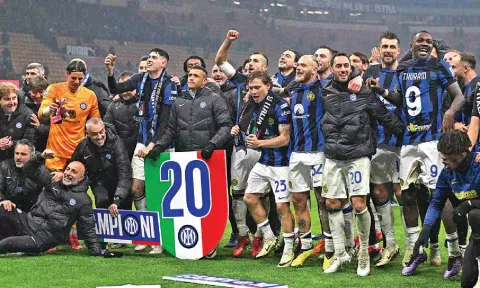 Inter Milan players celebrate after clinching the Scudetto