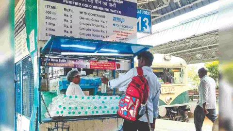 A passenger at a water filling shop run by the Railways department (Photo: Deepak ST)