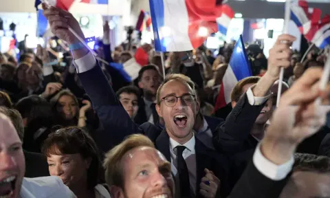 Supporters of French far-right National Rally react at the party election night headquarters&nbsp;