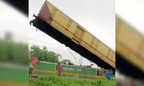 &nbsp;Locals gather after a collision between the Kanchanjungha Express and a goods train (PTI)