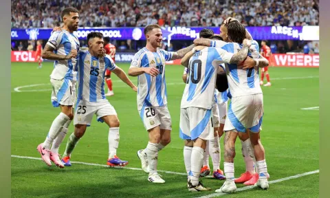 Argentina celebrates scoring the second goal against Canada