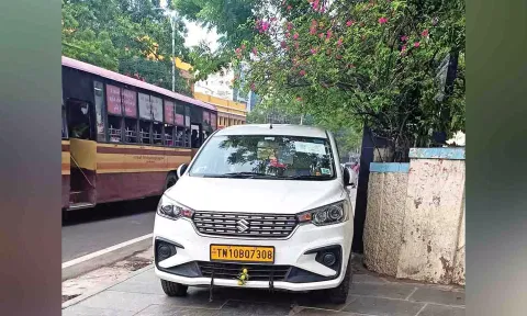 A vehicle contracted by the union government parked on the pavement in front of the railway office near Egmore Metro Station entrance