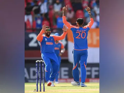 Rohit Sharma celebrating with Axar Patel (Photo: ICC/Instagram)